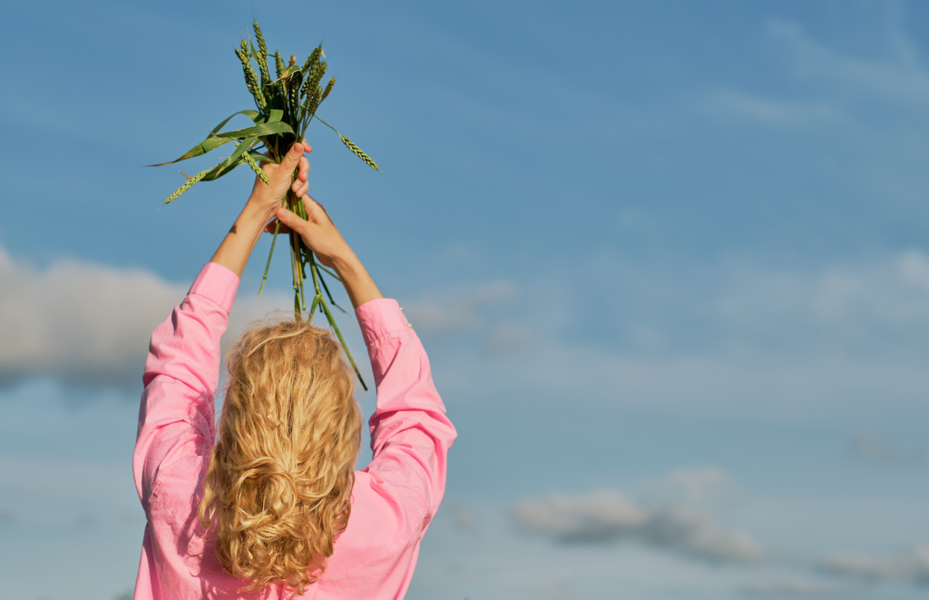 woman raised her hands sky hands ears wheat blue sky with clouds selective focus with copy space idea banner background 1